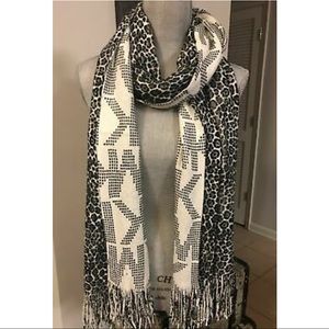 MK leopard print reversible scarf.